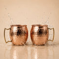 Two copper mugs