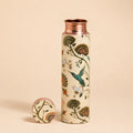 Decorative water bottle with floral and bird design 