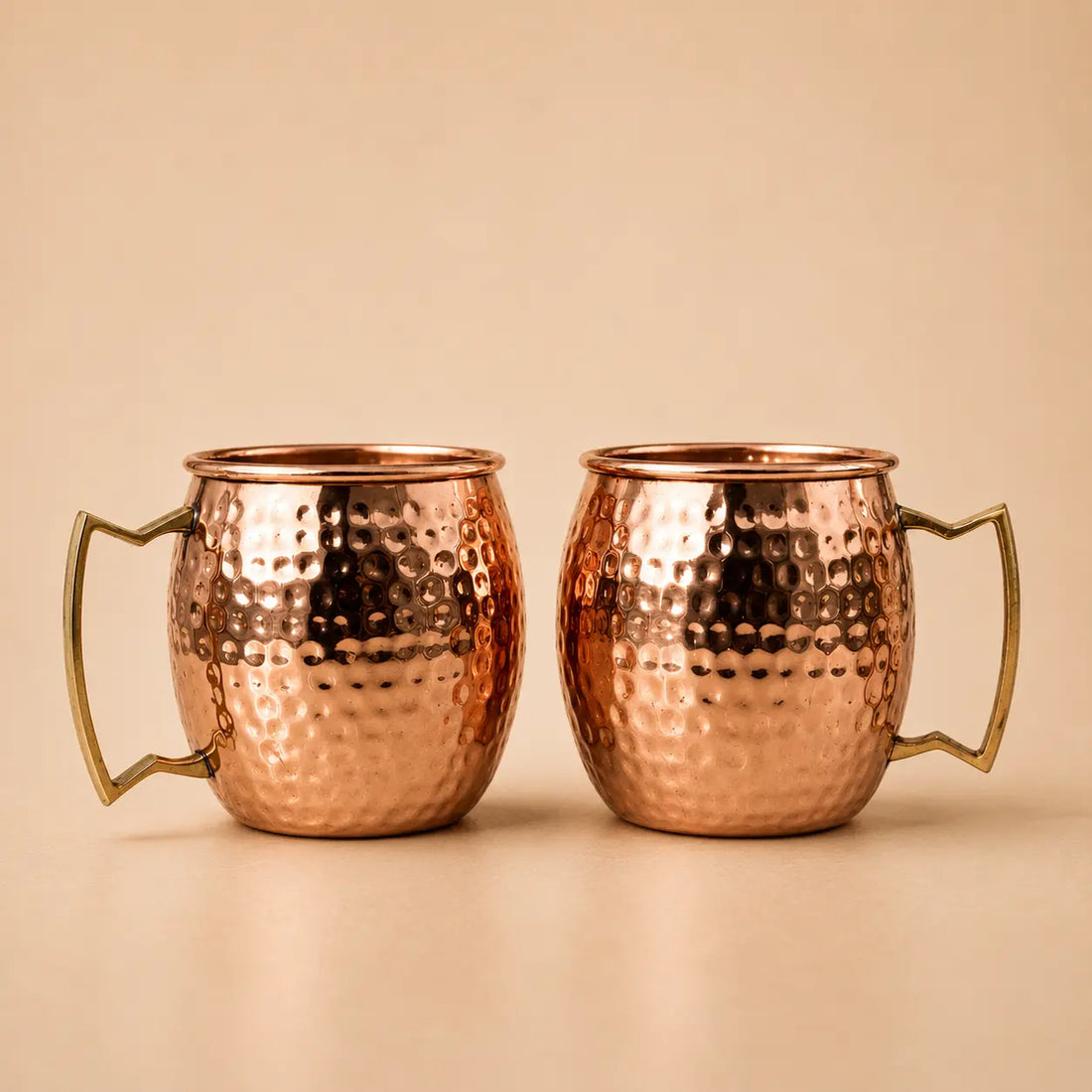 Two copper mugs 