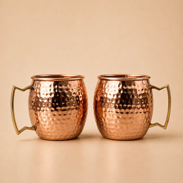 Two copper mugs 